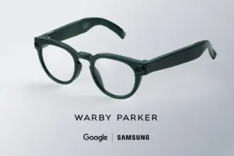 Dark green round eyeglasses on a light background with branding text below (Warby Parker, Google, Samsung).